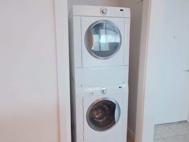 Building Photo - Experience elevated high-rise living at The Martin.