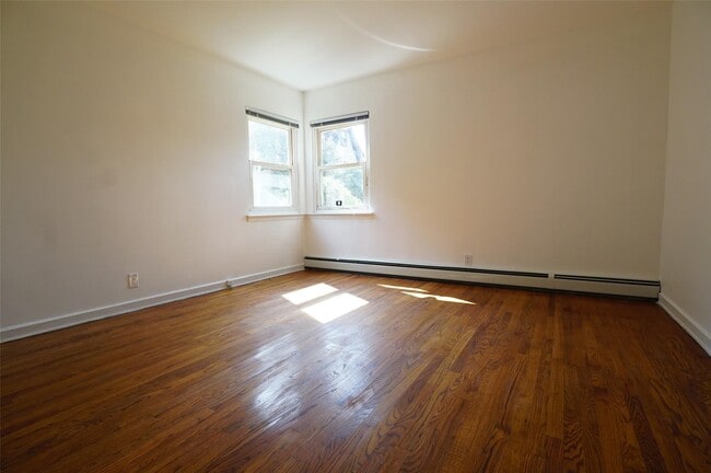 Building Photo - 203-12 42nd Ave