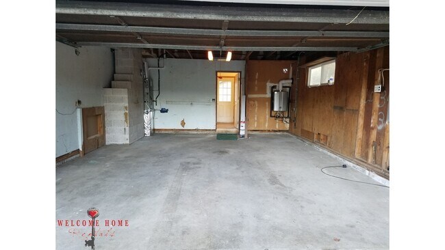 Building Photo - Beautiful Remodeled Rambler!!!  Come enjoy this HUGE backyard!!  NEW CARPET!!