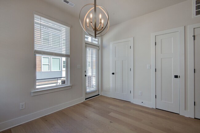 Building Photo - COMING SOON! Modern End-Unit Living Near Uptown | Rooftop Terrace + Tandem Garage