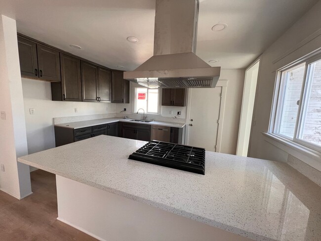 Building Photo - FULLY REMODELED 2BR/1BA home w/ parking an...