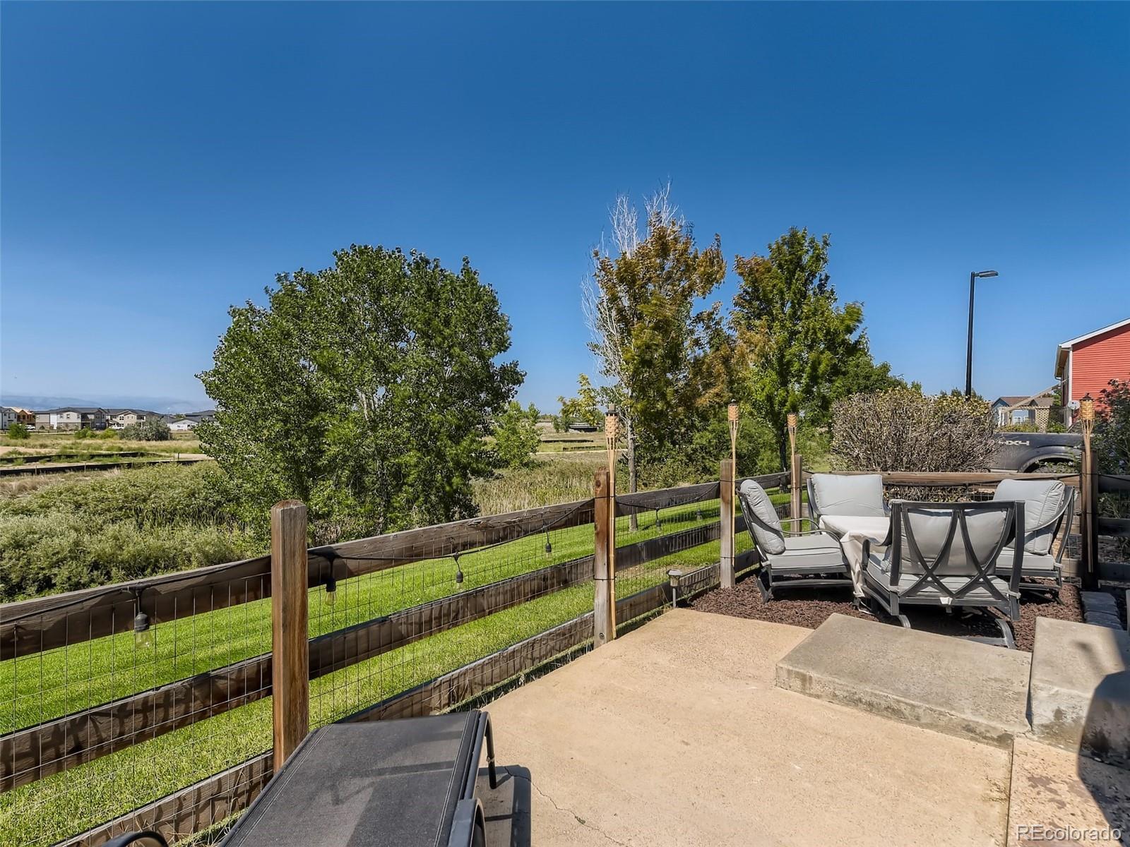 Back fenced in patio. - 244 Montgomery Dr