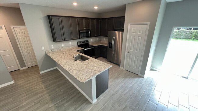 Building Photo - AWESOME 3 Bedroom, 2 Bathroom Home in Beautiful Palm Bay!!