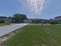 Building Photo - 4 Bed Navarre Home on Half+ Acre, Fenced Yard & Detached Garage Near Hurlburt