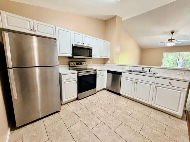 Building Photo - Charming 3BR/2BA Lehigh Acres Duplex with 1-Car Garage | Lawn Care & Salt Service Included