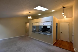 Building Photo - Spacious and Sunlit 2BR/2BA Condo with Por...
