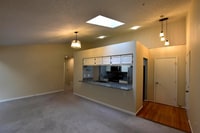 Building Photo - Spacious and Sunlit 2BR/2BA Condo with Por...