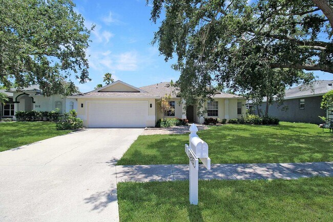 Building Photo - Annual rental: Spacious 3BR/2BA Creekwood Home with Office, Screened Lanai, EV Charger & Resort-S...