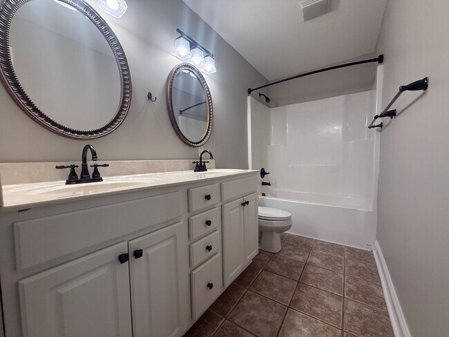 Building Photo - Pet-Friendly One-Level Home with Fenced Yard, Garage & Stainless Steel Appliances