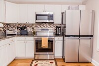 Building Photo - 2 Bedroom/ 2 bath - entry level END UNIT w...