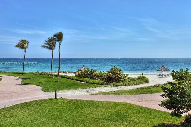 Building Photo - 19116 Fisher Island Dr