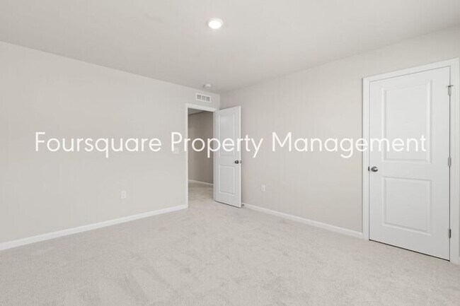 Building Photo - Coming Soon; July 27, 2026 : End unit ToSpacious End-Unit Townhome with 2nd Floor Loft, Screened-...