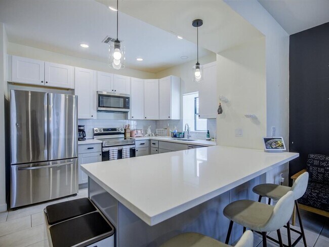 Building Photo - Fully Furnished 3-Bedroom Home with Security & Modern Upgrades