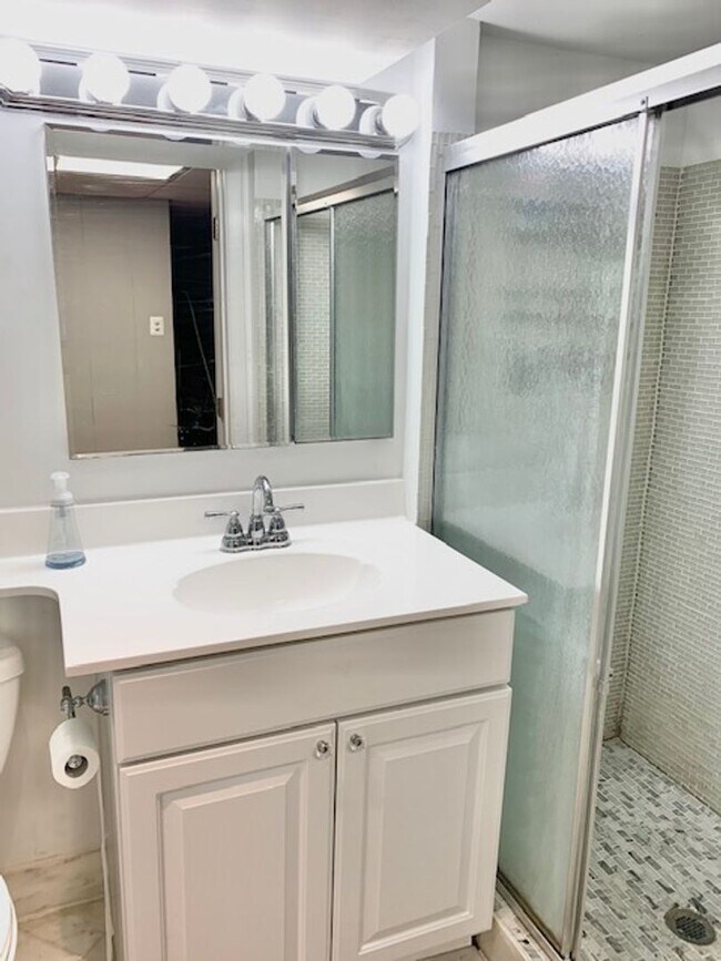 Building Photo - Light filled 2 BR plus 2 rooms, 2 FB including one in finished basement. Great location