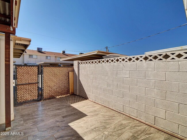 Building Photo - 8522 E Montebello Ave