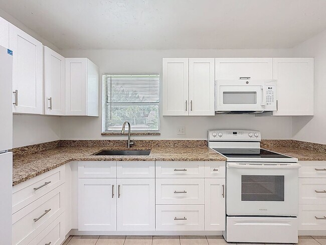 Building Photo - Desirable 55 plus community condo unit with a view of the lake on the 2nd Floor.