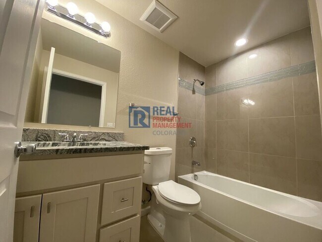 Building Photo - 875 E 78th Ave