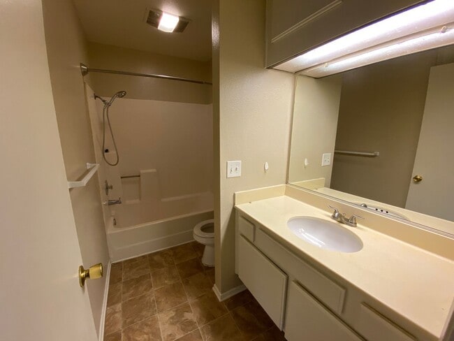 Building Photo - 2 BR 2 BA Corner Condo w/Balcony W/D Gated Entry Carport + Space