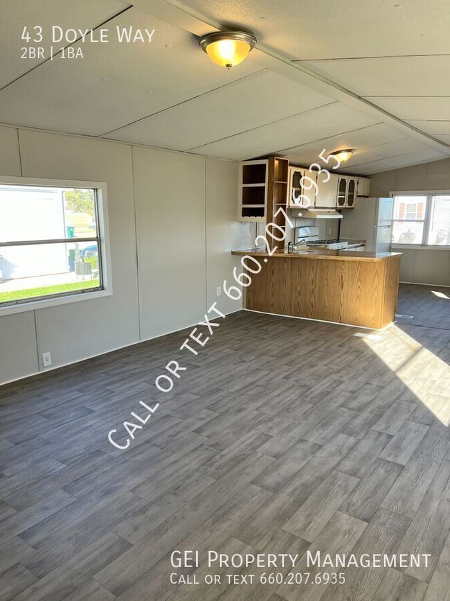 Building Photo - Cozy updated 2 bedroom home! Home Warranty...