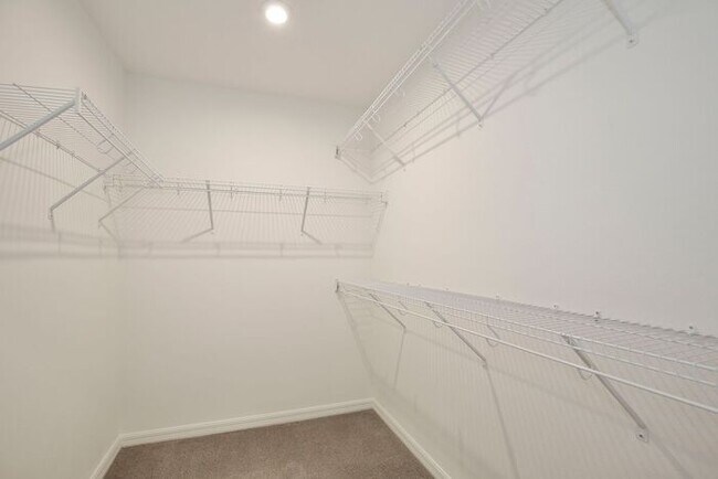 Building Photo - Luxurious 3/2.5 Modern Townhome with a Private Balcony and a 2 Car Garage in the Exclusive Gated ...