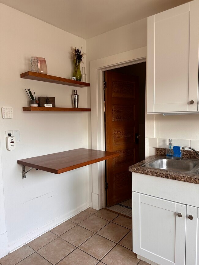 Extra counterspace that folds down. - 6029 Portland Ave