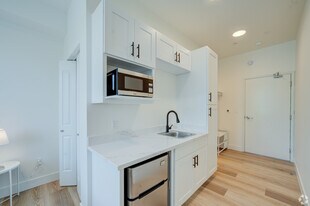 Building Photo - Poets Place Apartment