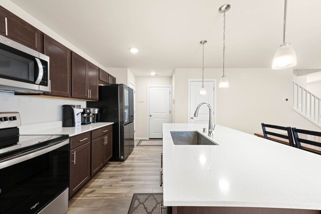 Building Photo - Spacious 3-Bedroom Home with Bonus Room, Main-Floor Den & Covered Patio Near JBLM