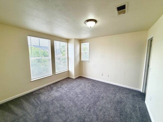 Building Photo - Freshly Painted w/ New Carpets 3 Bedroom, 2 Bath With Attached Garage