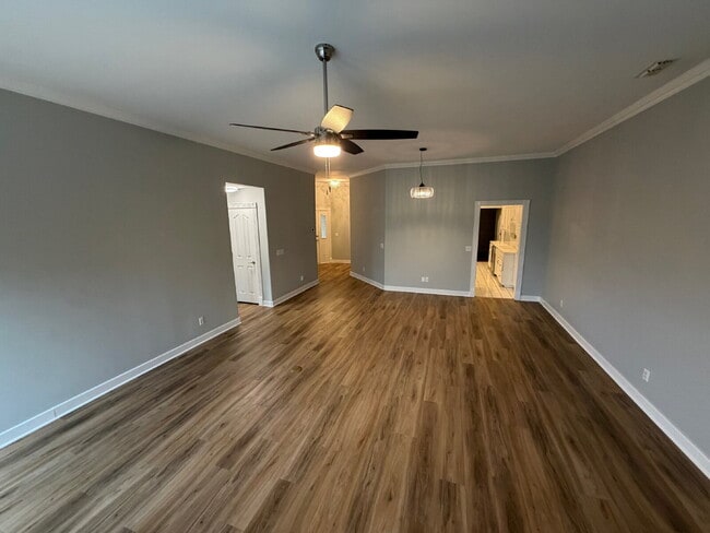 Building Photo - Elegant, Low Maintenance Townhome Designed for Elevated Everyday Living!