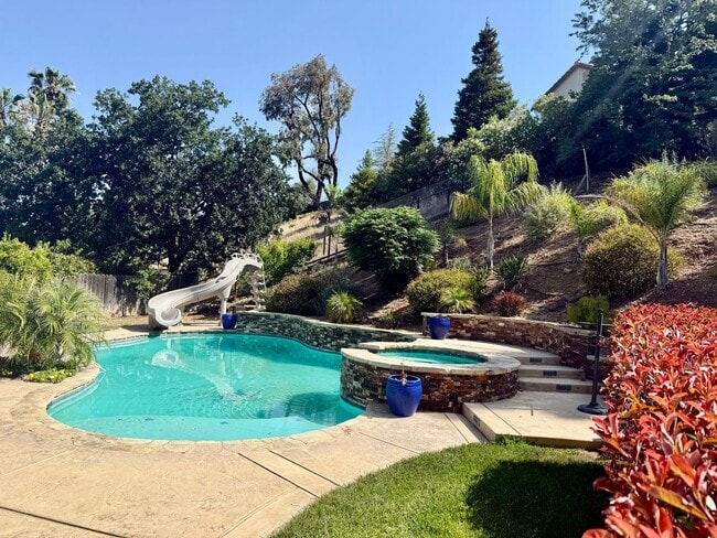 Building Photo - Beautiful 4-Bedroom, 3-Bath Home with Pool...