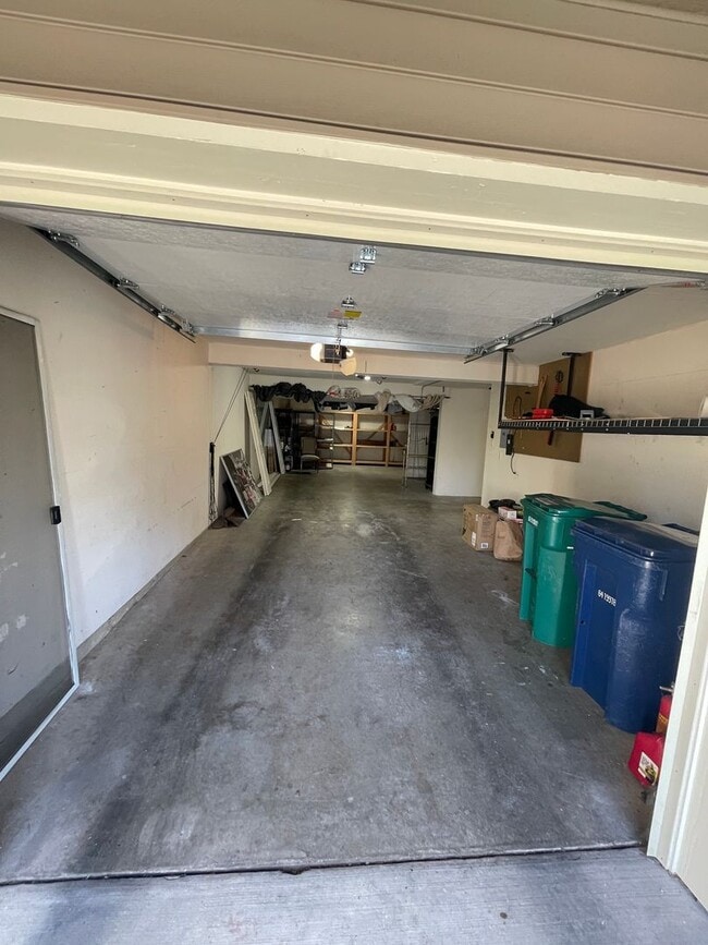 Building Photo - Hobbyist's Dream Garage and Serene Condo Living