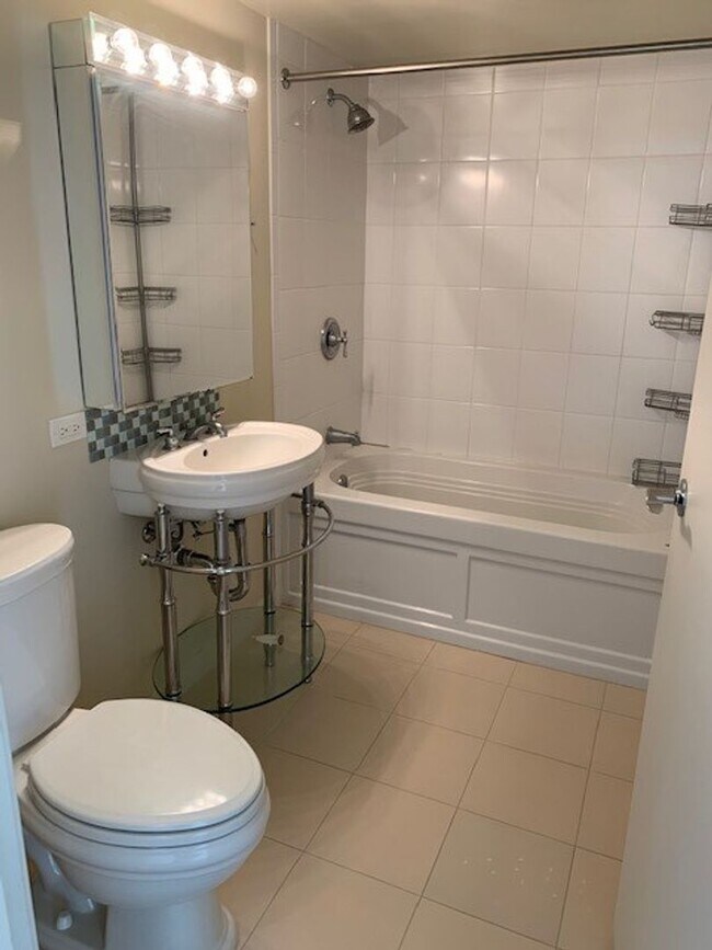 Building Photo - Moana Pacific - 2 bedroom plus den, 2 bath Condo with 2 parking - avail now!
