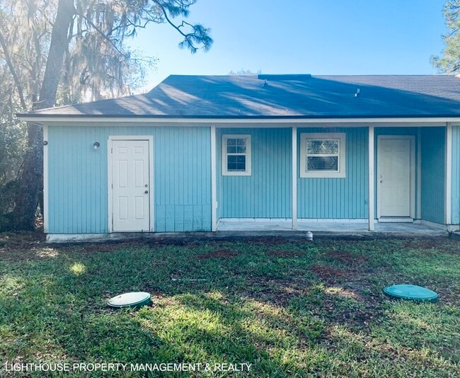 Building Photo - Spacious 2-Bedroom Duplex with Stainless Steel Appliances