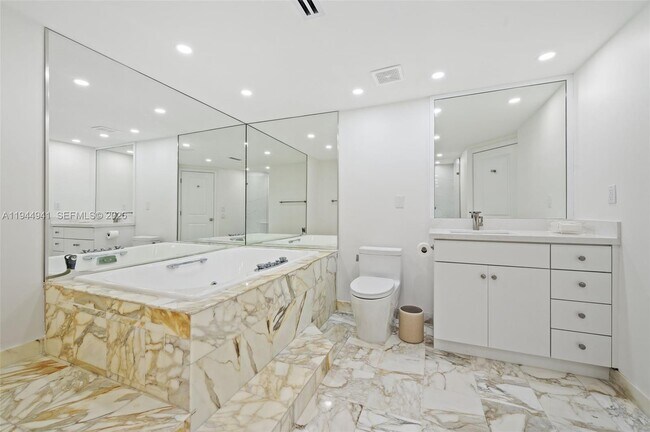 Building Photo - 10155 Collins Ave