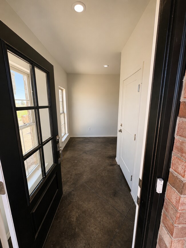 Building Photo - Stunning New 3/2 Townhomes