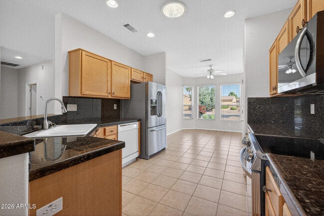 Building Photo - 15243 W Camino Estrella Dr
