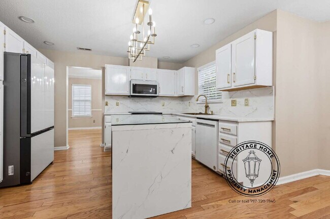 Building Photo - "Charming 4-Bedroom Retreat with Fireplace & Hardwood Floors on Michelle Drive!"