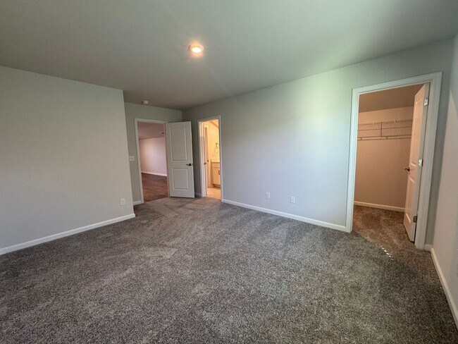 Building Photo - Spacious 1.5-Story 4BR Home with Bonus Room in Active 55+ Community