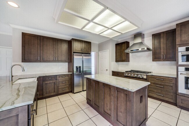 Building Photo - RENOVATED 4-BEDROOM IN MISSION RIDGE