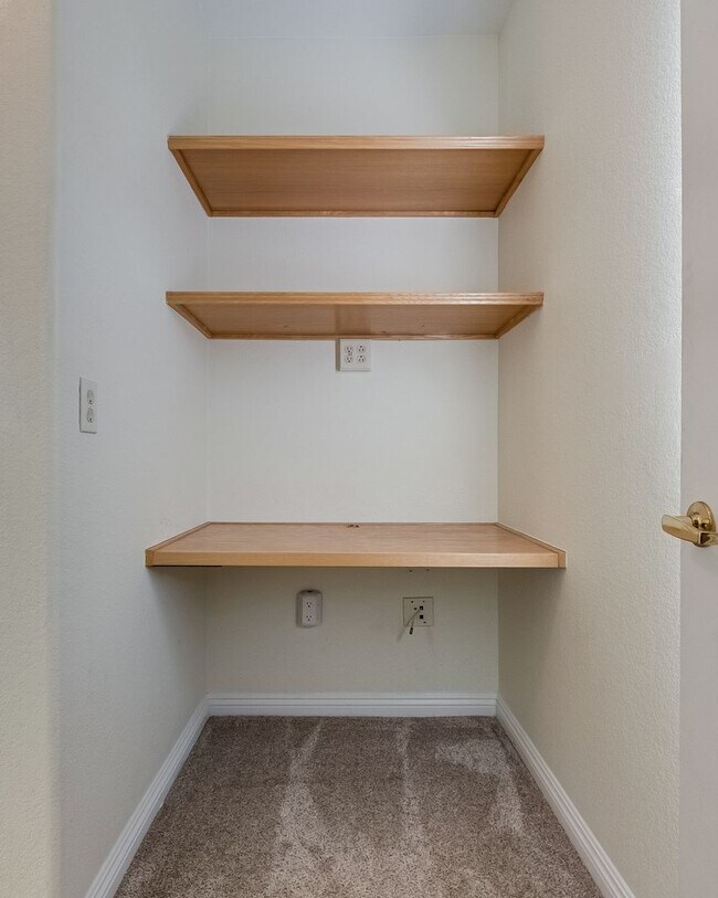 Building Photo - Move-In Ready Condo with Private Balcony & Modern Upgrades