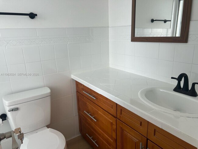 Building Photo - 8560 N Sherman Cir