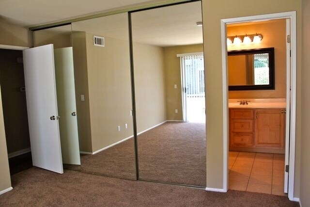 Building Photo - COMING SOON - 3 bed, 2 bath Townhouse with attached 2 car garage ready to move in!!