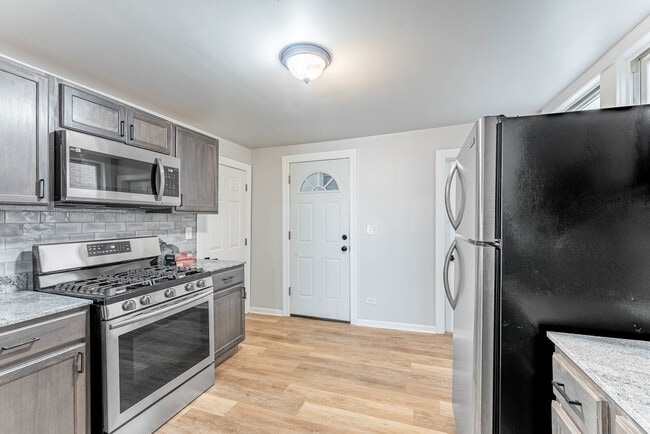 Building Photo - 3807 S Albany Ave