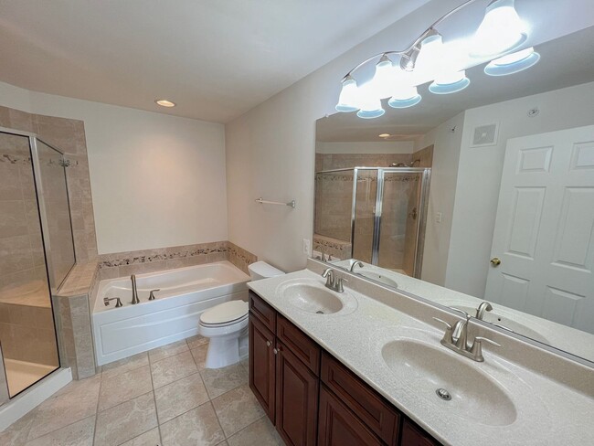 Building Photo - Lavish 3 Bed 2.5 Bath Brick Townhome In Ce...