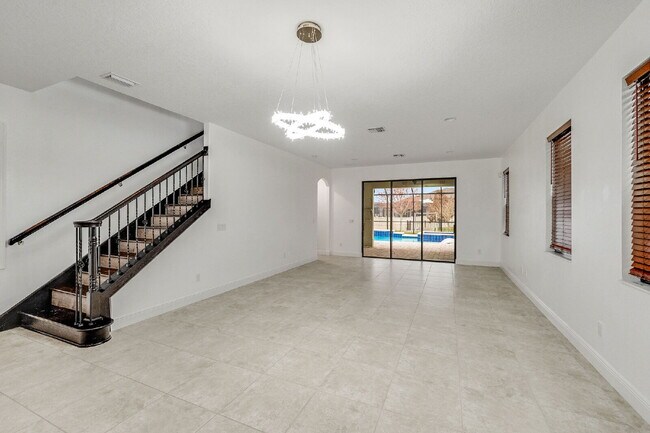 Building Photo - 4BR, 2.5BA home with resort style outdoor living!