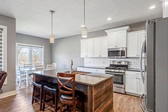 Building Photo - Waterfront Home in Buccaneer Bay with 3-Car Garage & Walkout Basement