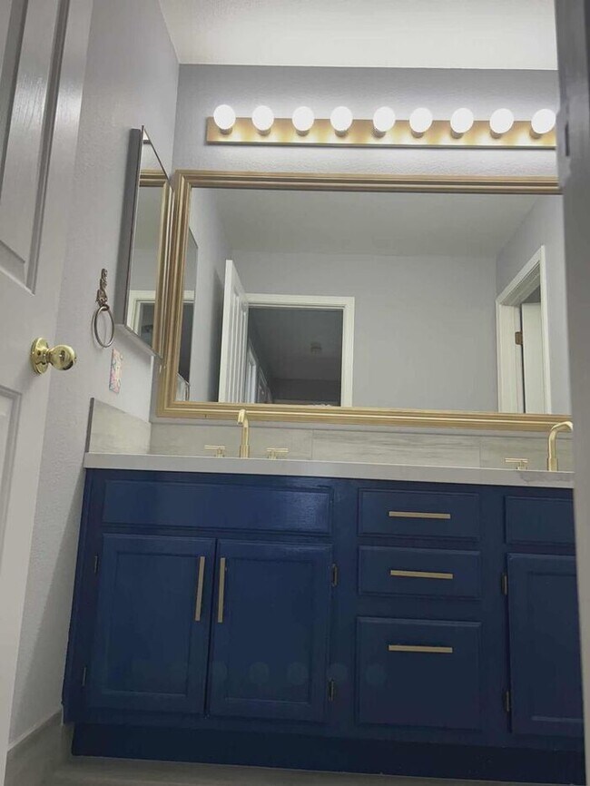 Building Photo - Welcome to this STUNNING 4-bedroom, 2.5-ba...