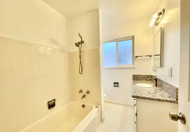 Building Photo - 6382 14th Ave