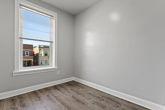Building Photo - 6239 S Langley Ave