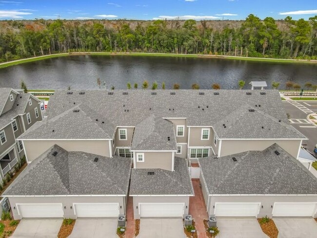 Building Photo - New Luxury Townhome in Celebration with All porcelain tiled floors. Island Village new construction